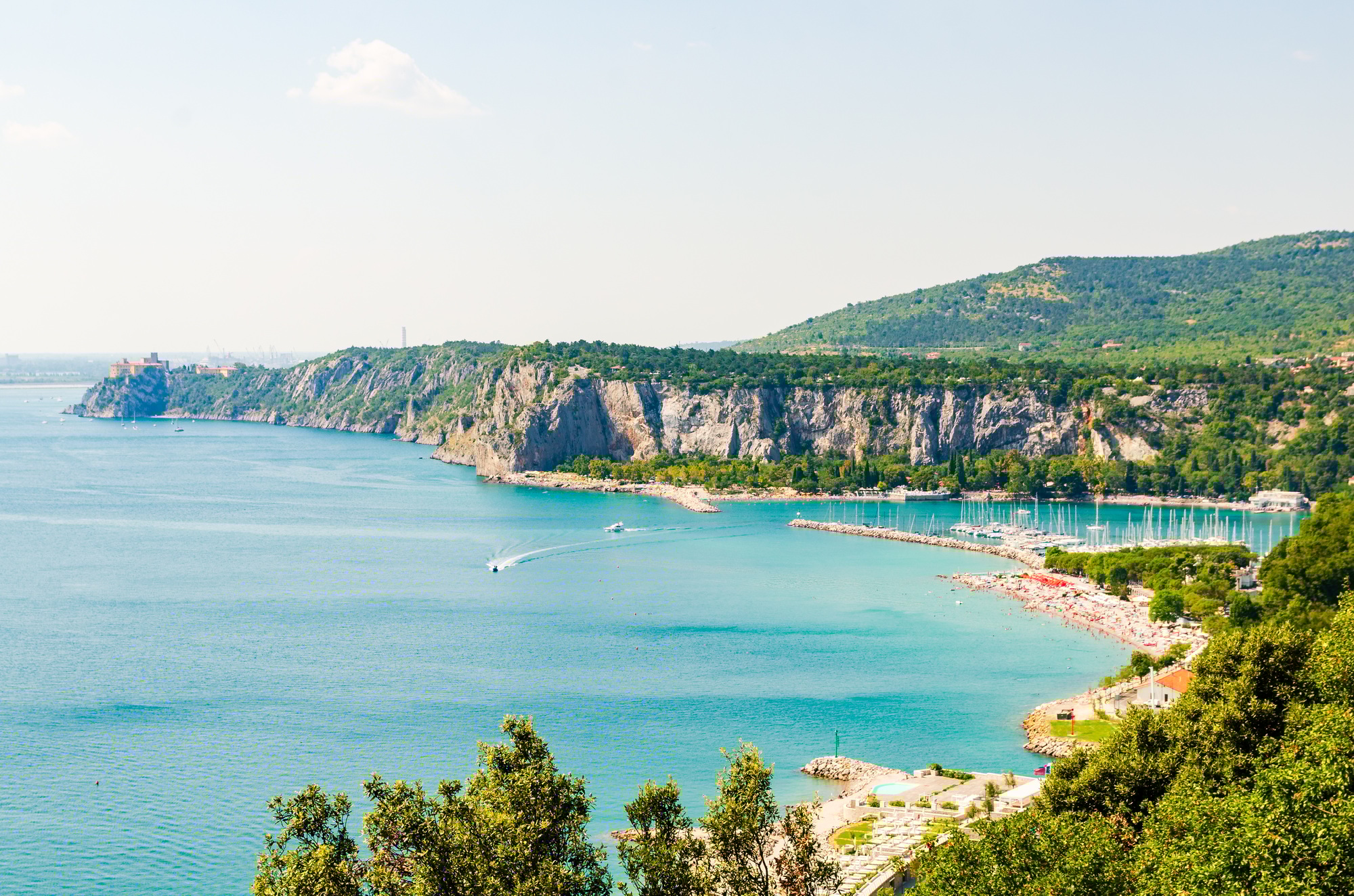 View at Bay with tourist resort in gulf of Trieste near town Sistiana, Italy, Europe. Travel